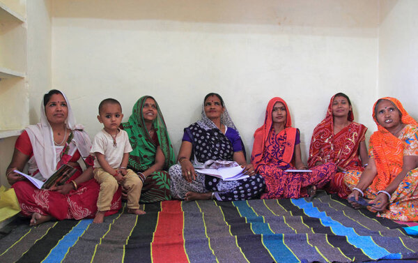 women are visiting educational center in Jaipur, India