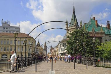 people are walking by lovers' Bridge in Kosice, Slovakia clipart