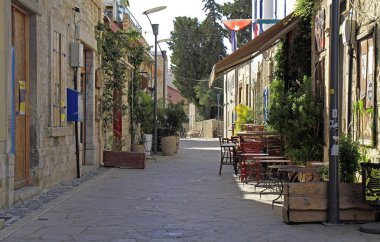 narrow street in the old town of Limassol clipart