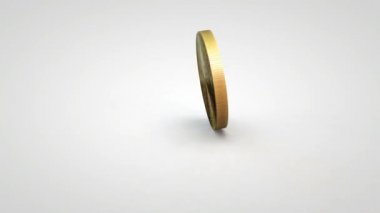 Tablo beyaz arka plan üzerinde iplik altın Iota sikke
