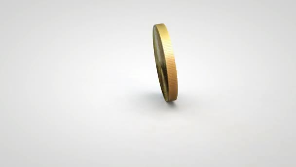 pièce de monnaie de jeune fille dorée filant sur fond blanc de table 