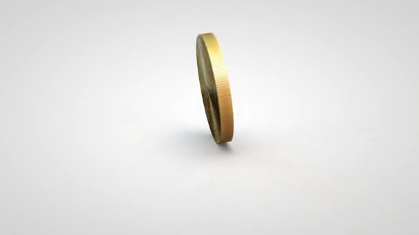 pièce de syscoin d'or filant sur fond blanc de table 