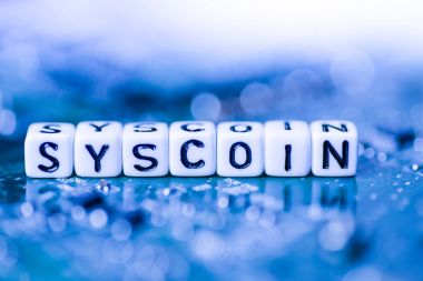 Word tarafından alfabe bloklar üzerinde anne cryptocurrency Syscoin