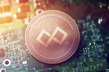 parlak bakır Tenx cryptocurrency sikke üzerinde bulanık anakart arka plan