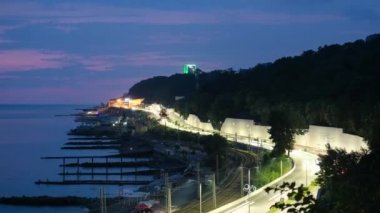 Time lapse videos. Heavy traffic on the road. Evening lighting of the route. Accelerated shooting. The view from the top.