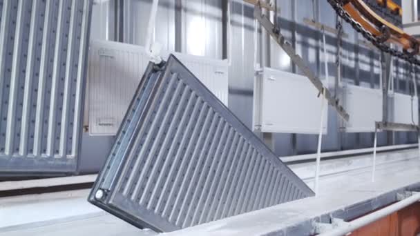 Conveyor line painting and drying of household heating radiators — Stock Footage Conveyor line painting and drying of household heating radiators Royalty Free Stock Video