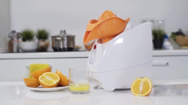 Mincer machine with citrus juicer in kitchen. White electric mincer machines for minced meat per minute, make sausages, mashed berries, squeeze juice and chop vegetables. — Stock Video
