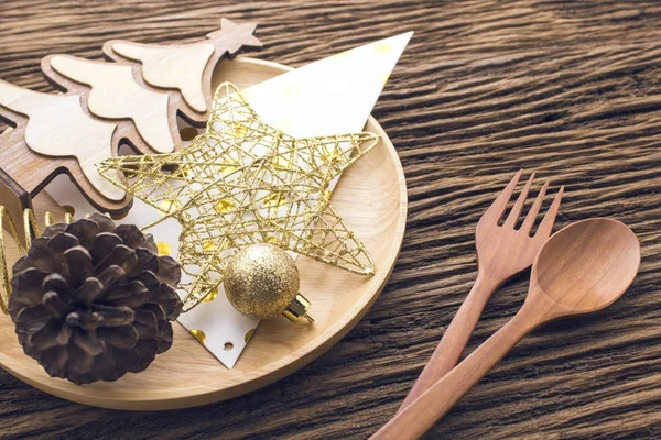 Decoración de accesorios de Navidad en el suelo de madera del concepto de cena —  Fotos de Stock