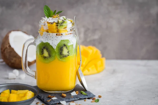 Mango,  coconut and chia seeds pudding in glass ja — Stock Photo, Image