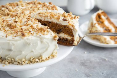 slice of carrot cake with cream cheese clipart