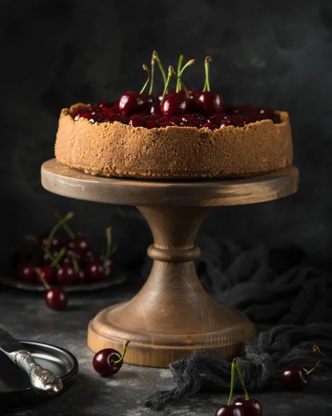 Cherry cheesecake on cake stand — Stock Photo, Image