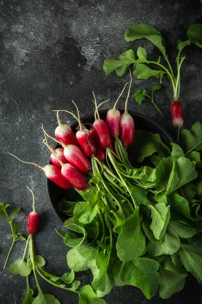 Bunch of fresh organic radish on dark background — Stock Photo, Image