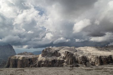 cloudy day in Dolomites Alps. Passo Pordoi. South Tyrol. Italy clipart