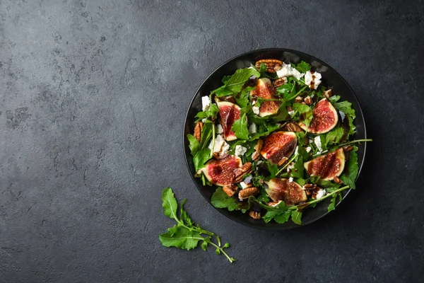 delicious figs, arugula, goat cheese and pecan nuts salad