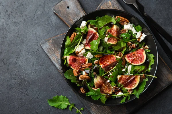 figs, arugula, goat cheese and pecan nuts salad