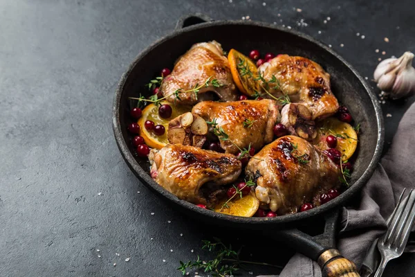 Roasted  chicken with orange, cranberry and spicy herbs on pan — Stock Photo, Image