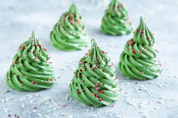 Christmas dessert idea - meringue Christmas trees, selective focus