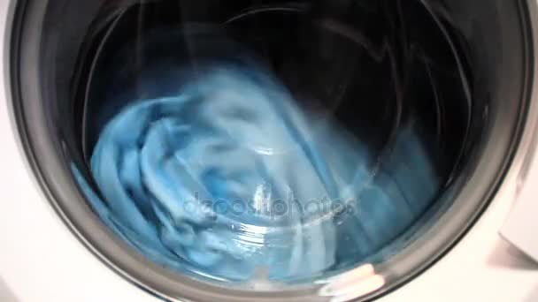 Vooraanzicht en gedeelte van de patrijspoort van de wasmachine — Stockvideo
