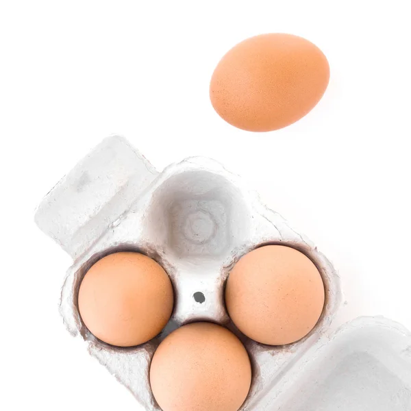 Huevos en una caja de cartón — Foto de Stock