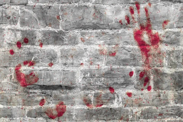 Bloedige handafdrukken en vlekken van bloed aan de muur van de grunge. — Stockfoto