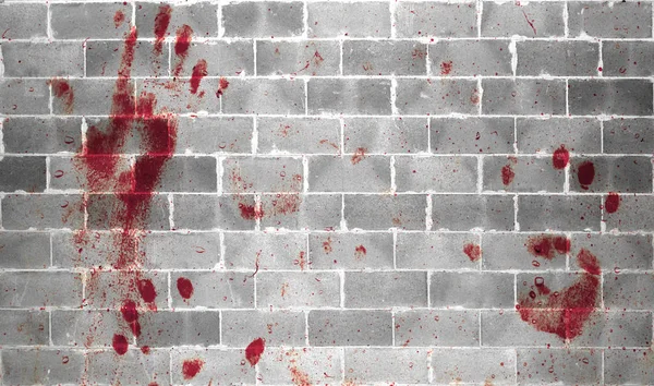 Bloody handprints and blotches of blood on grunge wall. — Stock Photo, Image