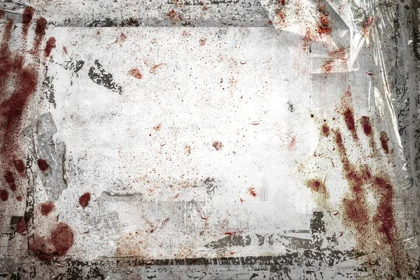 Horror achtergrond met grungy frame, bloedige handafdrukken, resten van plakband en cellofaan. — Stockfoto