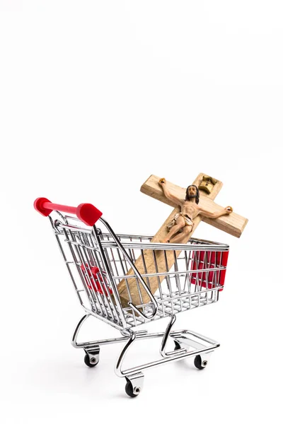 Crucifijo en carrito de la compra — Foto de Stock