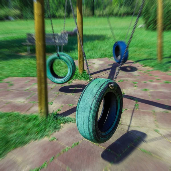 Tire swings hanging in park — Stock Photo, Image