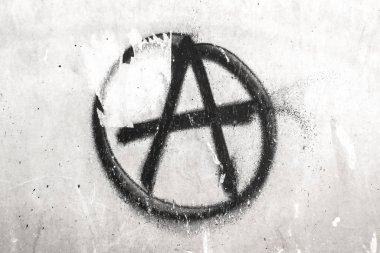 Symbol of Anarchy painted on a wall clipart