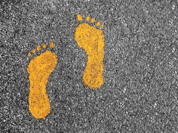 Orange Footprint Signs Asphalt Road Pedestrian Symbol Walkway — Stock Photo, Image