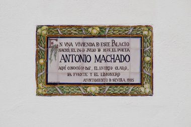 Sevilla (Spain). Plaque commemorating the birth of the poet Antonio Machado at the Palacio de las Duenas (Casa de Alba) in the city of Seville clipart