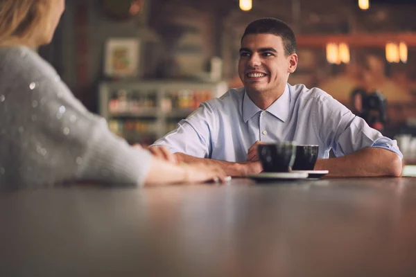 Handsome man with woman sitting in cafe — Stock Photo, Image