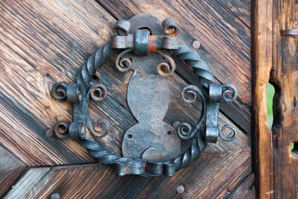 Old iron door rusty lock  and  handle on wooden door — Stock Photo, Image