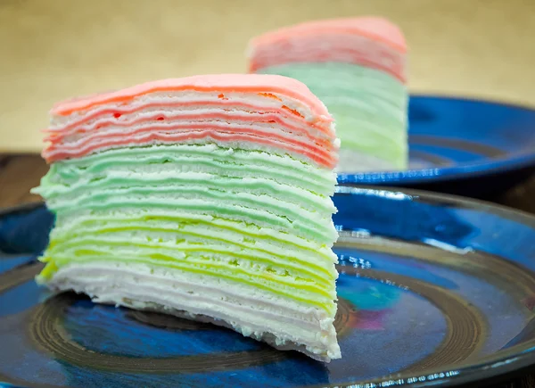 Rainbow vanilla crepe cake. Food image