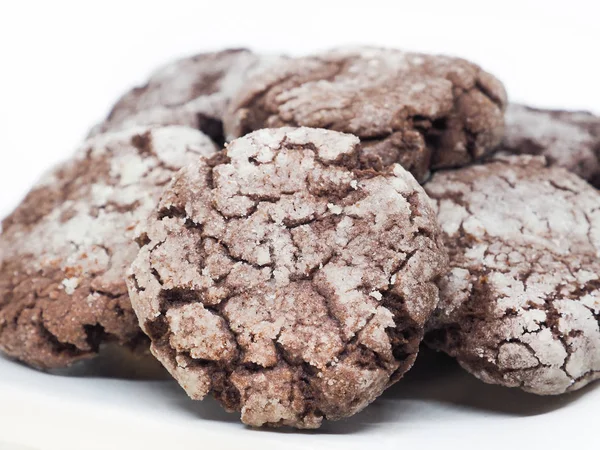 Chocolate with almond cookies in powdered sugar — Stock Photo, Image