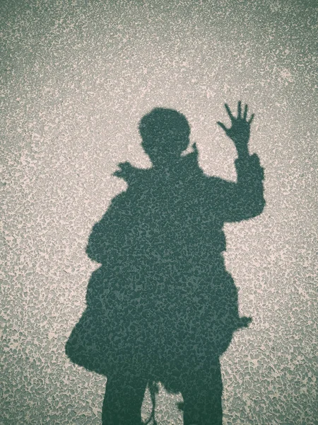 Shadow of a man on street concrete background — Stock Photo, Image