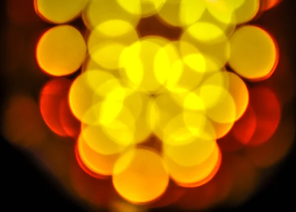De focused yellow and white bokeh twinkling lights background — Stock Photo, Image