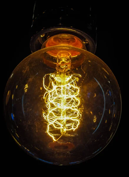 Vintage glowing light bulb — Stock Photo, Image