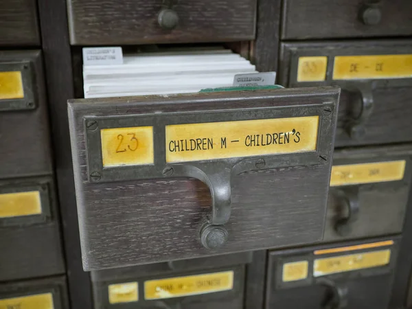 Open wooden boxes with index cards in library, Tag Content is 