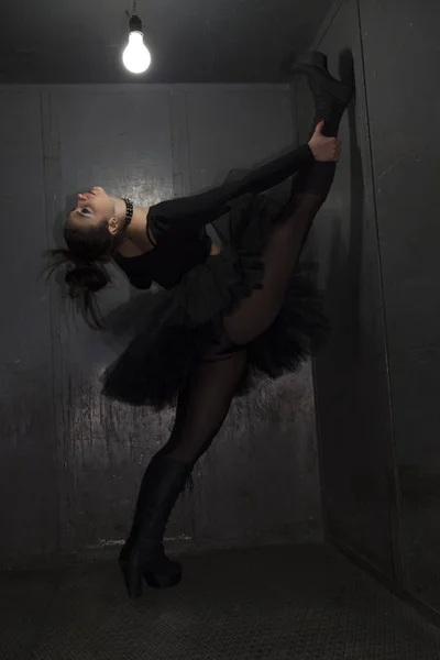 Sexy fetish ballerina in metal room. — Stock Photo, Image