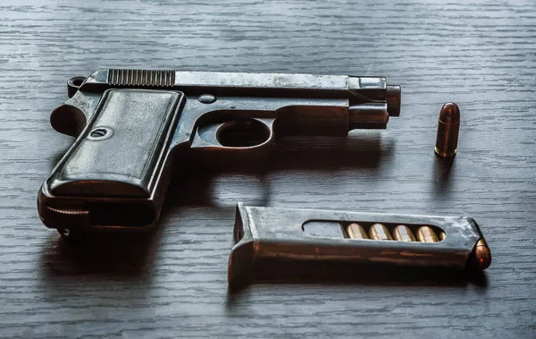 Beretta pistol with bullet magazine