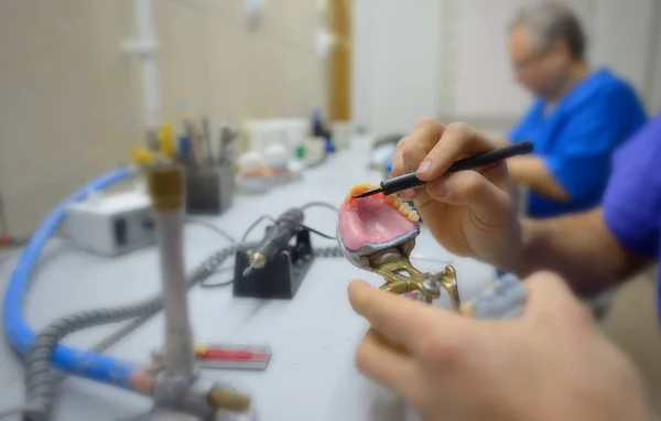 Closeup of dental technician — Stock Photo, Image