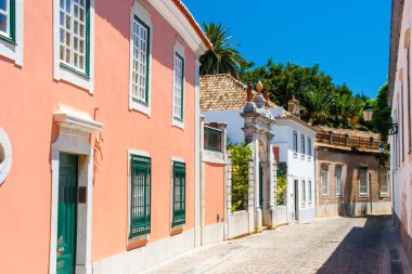 Typical street in Faro, Portugal clipart