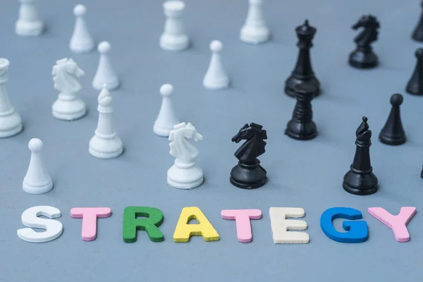 戦略とチェスの木製のテキストの背景 — ストック写真