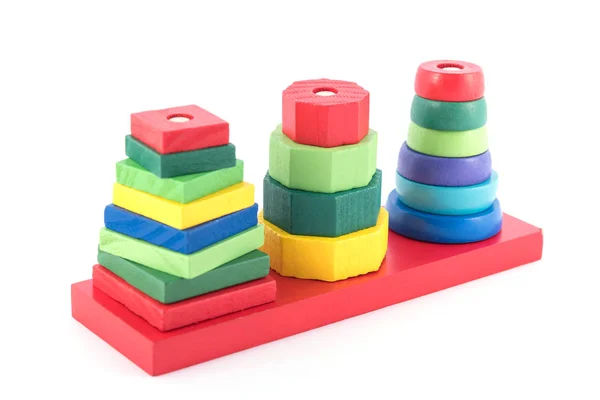 Pila de muchos bloques de construcción de cubos de forma sobre fondo blanco, c — Foto de Stock