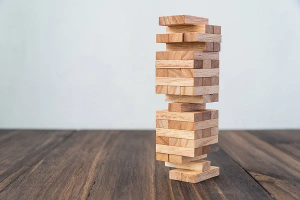 wood block stack on white table