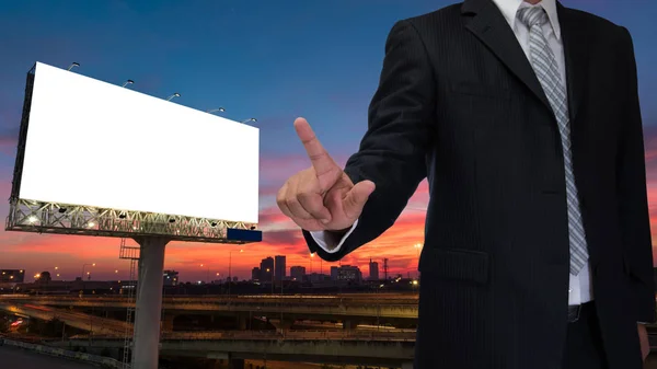 Businessman and blank billboard at twilight sky sunset ready for — Stock Photo, Image