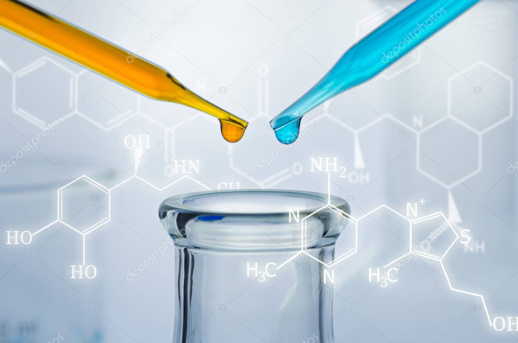 science laboratory test tubes with chemical formular