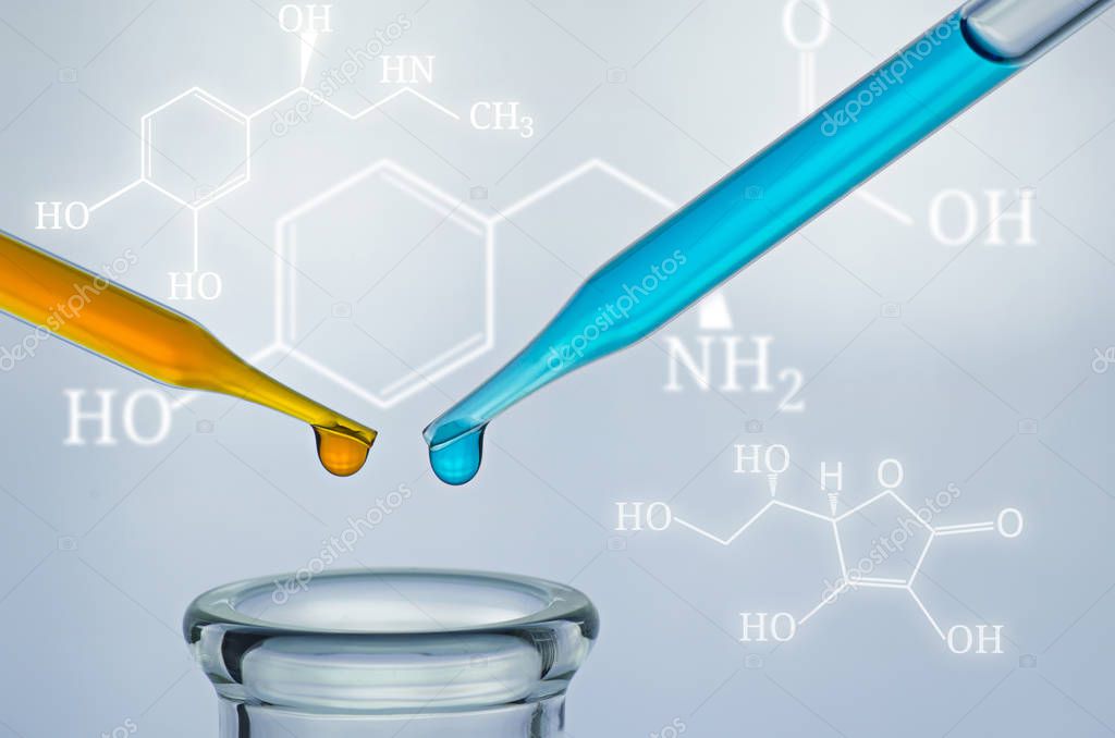 science laboratory test tubes with chemical formular