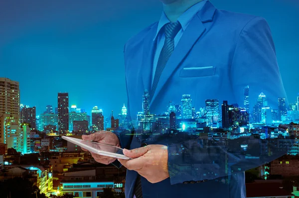 Double exposure of business man using tablet — Stock Photo, Image